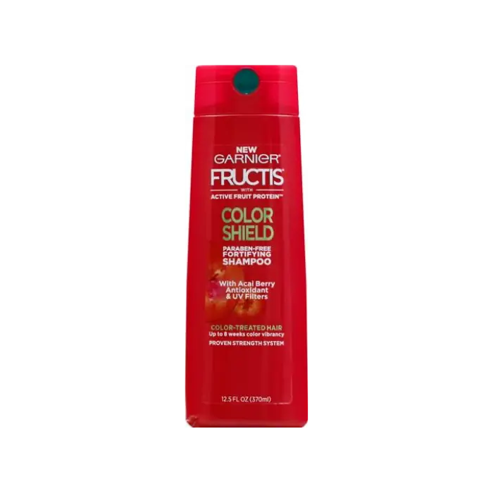 Garnier Fructis Color Shield shampoo bottle with acai berry antioxidants, featuring blue and orange branding